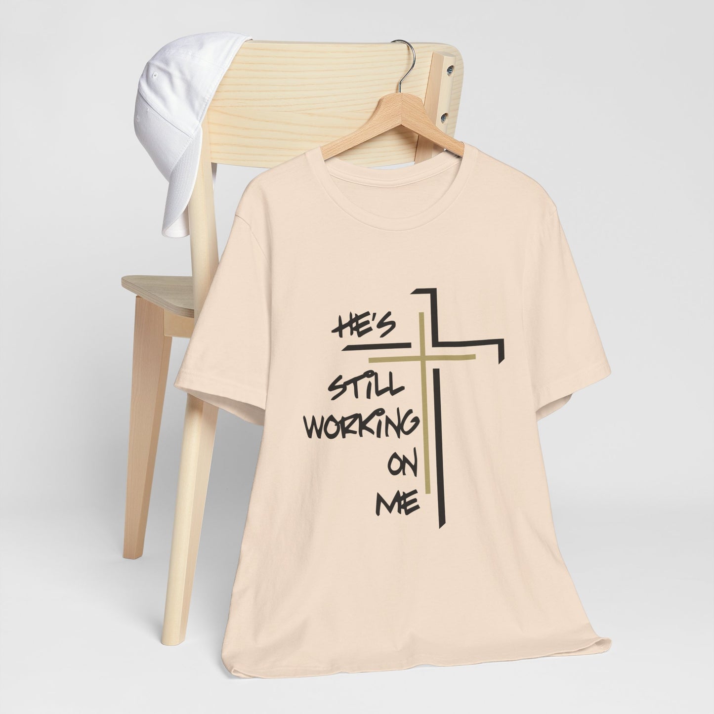 He's Still Working On Me - Unisex Jersey Short Sleeve Tee