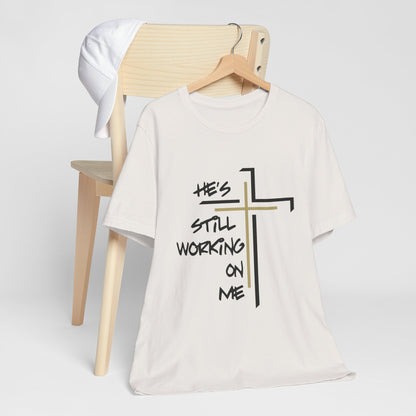 He's Still Working On Me - Unisex Jersey Short Sleeve Tee