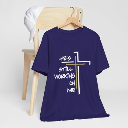 He's Still Working On Me - Unisex Jersey Short Sleeve Tee