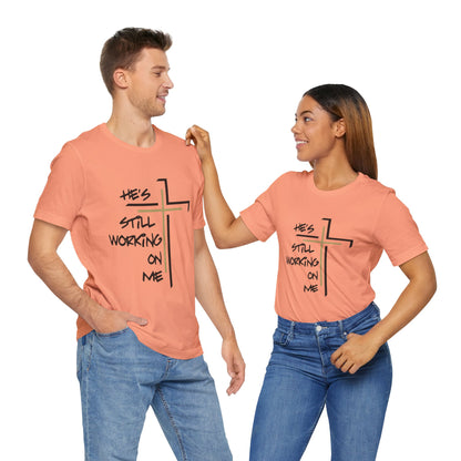 He's Still Working On Me - Unisex Jersey Short Sleeve Tee