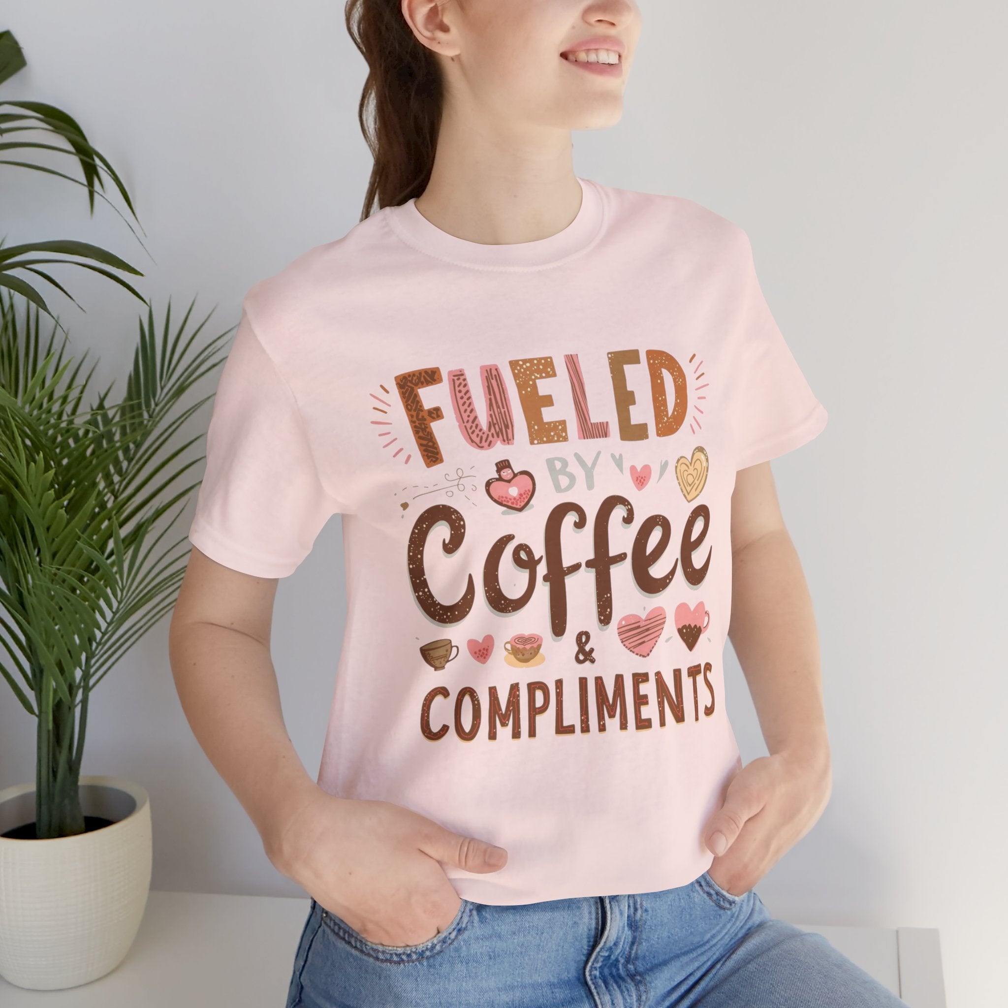 Fueled by Coffee & Compliments – Unisex Tee