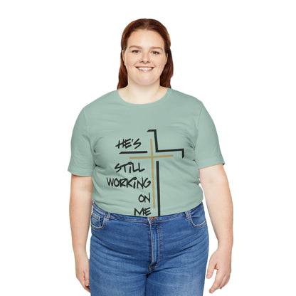 He's Still Working On Me - Unisex Jersey Short Sleeve Tee