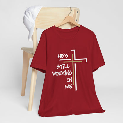 He's Still Working On Me - Unisex Jersey Short Sleeve Tee