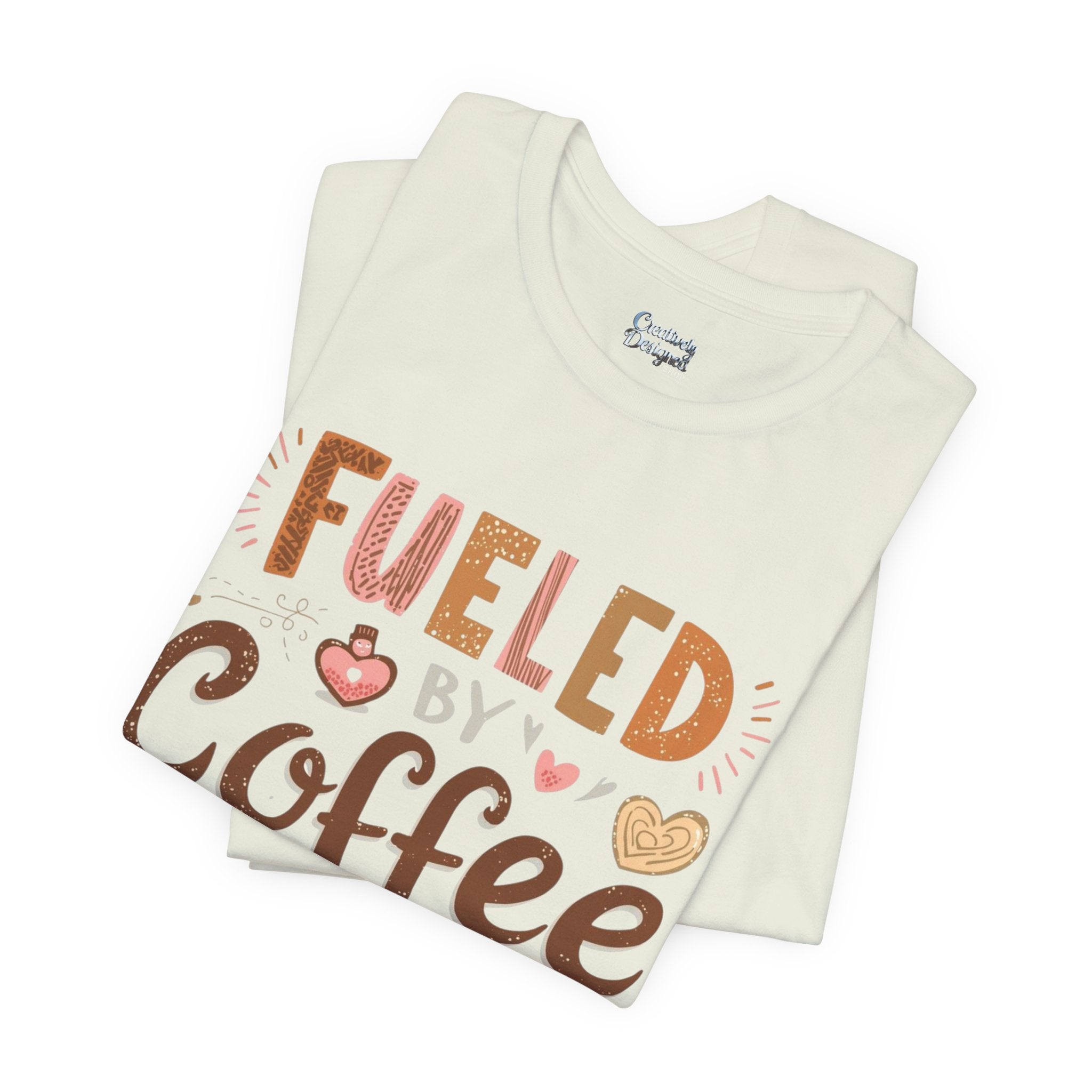 Fueled by Coffee & Compliments – Unisex Tee