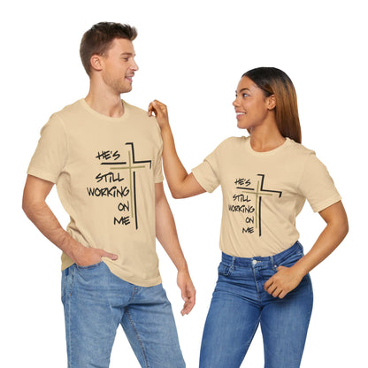 He's Still Working On Me - Unisex Jersey Short Sleeve Tee