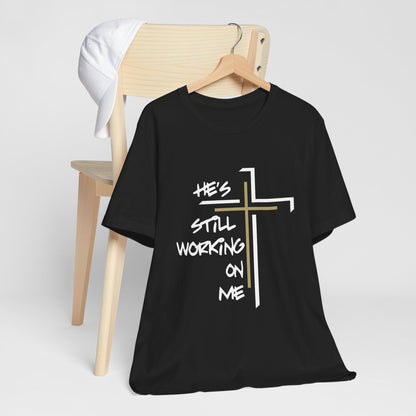 He's Still Working On Me - Unisex Jersey Short Sleeve Tee
