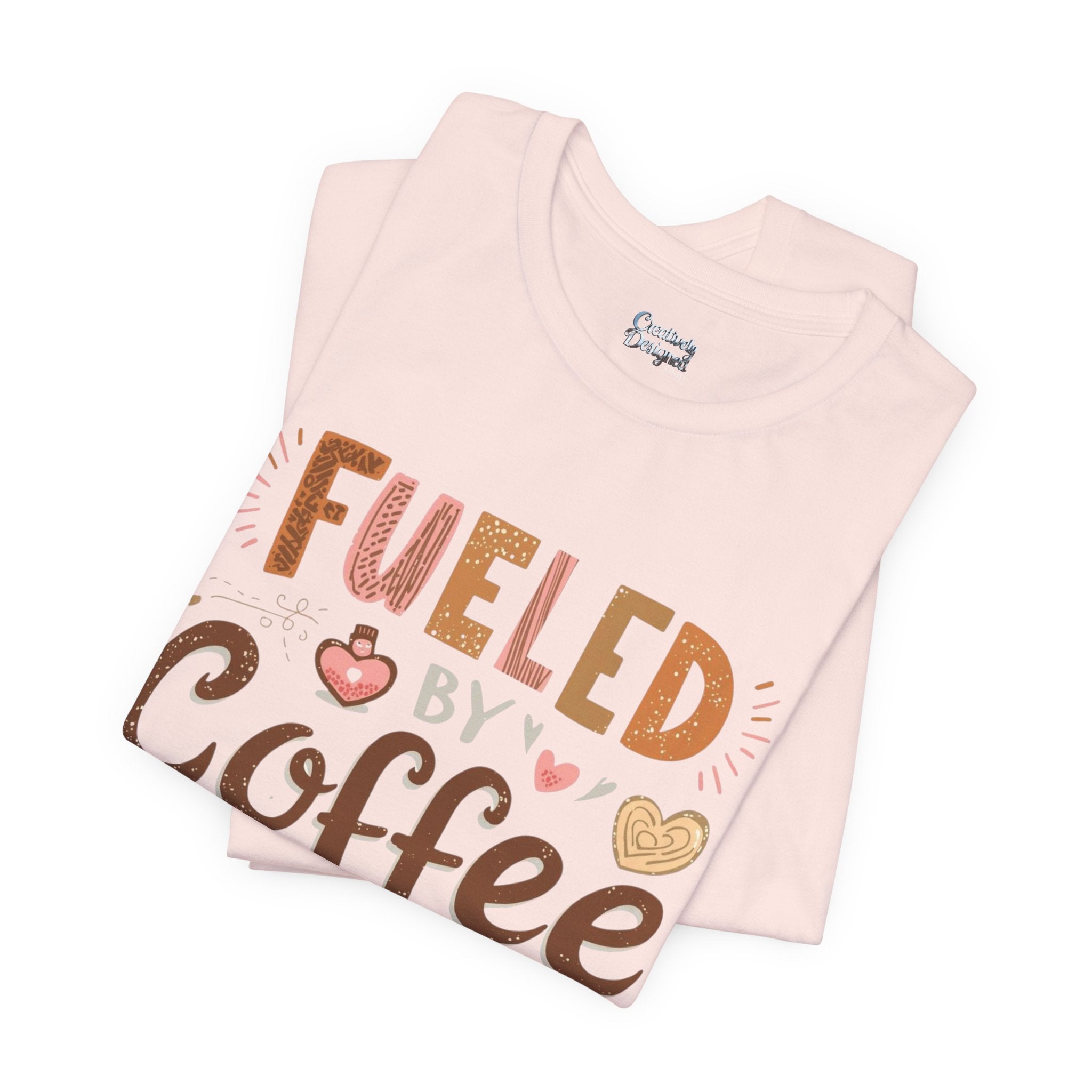 Fueled by Coffee & Compliments – Unisex Tee